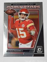 Front view of 2021 Panini Donruss Optic Dominators insert featuring Patrick Mahomes II in Kansas City Chiefs uniform throwing football.