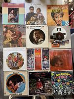 Overview of all 12 vinyl records showing cover art and titles
