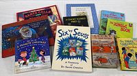 Overview of 11 children’s books showing a variety of titles and authors.