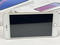 Front view of the Apple iPhone 6 Plus screen turned off, showing device in good visible condition.