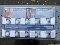 Full view of two Magic Holder tool organizers in original packaging showing 5 slots each and printed instructions.