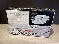 Box front showing brand, product name, and basic features with some box damage visible.