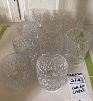 Ten glasses arranged in two rows showing diamond cut pattern