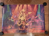 Full shot of the 1983 Greg Hildebrandt TOTENTANZ poster depicting skeleton rock band on stage under colorful lights