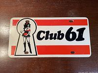 Front view of the vintage Club 61 Gatineau QC collector license plate showing design and condition