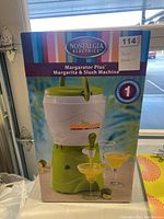 Box front showing machine image, model name, brand, and handwritten note 'Slush machine'.