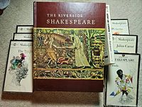 Photo shows the collection with The Riverside Shakespeare hardcover at center and the surrounding paperbacks with varied Shakespeare play titles arranged around it.
