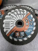 Close up of front face of Walter Zipcut cutting wheel showing label with size 7" x 1/16" x 7/8" and branding