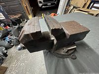 Side view showing large serrated jaws and thick handle for tightening.