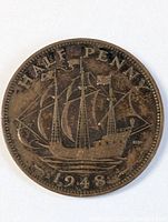Obverse side of the 1948 Great Britain half penny coin showing the sailing ship and inscription 'HALF PENNY' with the date '1948' at the bottom.