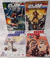 Four G.I. Joe comic books displayed flat showing full covers, arranged in two rows of two. Top row includes Image Comics and America's Elite series, bottom row includes two Storm Shadow titles.