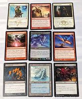 Nine Magic The Gathering cards laid out showing fronts clearly.