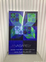 Full front view of the framed poster showing geometric Op Art design and text.
