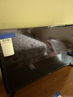 Front view of the Samsung flat screen TV showing the screen and part of the bezel.