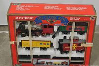 Original boxed 26-piece Echo Toys Classic Rail train set showing locomotives and cars secured inside box with clear plastic window.