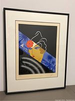 Full view of the matted and framed print showing thin black frame and double mat.