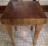 Front view showing top surface and legs