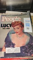Front cover of People Weekly magazine featuring Lucy 1911-1989 in a color photographic cover wearing a necklace and purple dress