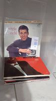 Stack of vinyl records with Sergio Franchi front album visible