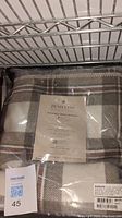 Pendleton blanket in plaid pattern with label and packaging visible