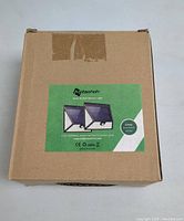 Box front showing brand 'Mitaahoh' and image of two solar motion sensor lights. Indicates 2-pack.