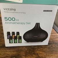 Box showing Victsing 500ml Aromatherapy Set model HM582A with image of diffuser and essential oils.