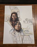 Signed Paul Ygartua lithograph artwork showing two indigenous figures with totem animals and background buffalo, measuring approximately 18" x 24".