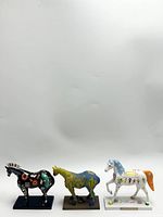 Full view of the 3 Trails of Painted Ponies figurines showcasing different designs and bases.
