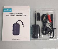 Box with Beeitzie Wireless Audio Receiver/Transmitter model B101 and all accessories in plastic tray