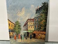 Full view of the oil painting showing street scene with buildings and figures.