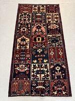 Full view of rug showing overall grid panel design and colors