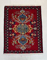 Full view of hand knotted Persian Kashan wool rug.