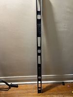 Full length photo of the Stanley 2ft aluminum level showing three bubble vials
