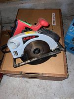 Top-down view of Airco circular saw showing blade guard, handle, and brand label.