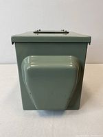 Closed weatherproof electrical box showing durable metal construction, protective lid, and front outlet cover.