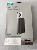 Front packaging of ESR Wireless Power Bank showing a black power bank attached magnetically to the back of a smartphone, with 10,000mAh capacity and MagSafe compatibility.
