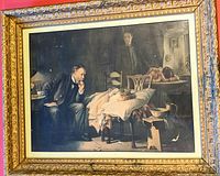 Oil or acrylic painting in an ornate gold frame showing a historical medical scene with a doctor examining a patient.