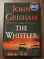 Front cover of the book showing title, author, and cover art with a 40% off sticker.