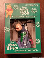 Eeyore resin Christmas ornament in original green Alderbrook box with Winnie the Pooh branding