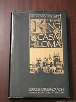Front cover of the hardcover book showing title, author, and illustration of Casa Loma castle.