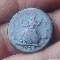 Front side showing Britannia seated with shield and trident, dated 1749.