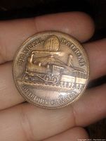 Obverse side showing steam locomotive and 'Big Nickel Railroad Sudbury Canada' text.