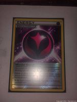 Clear image of Wonder Energy Holo Pokemon trading card, showing holographic effect and card details.