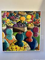 Frontal view of the large colorful oil painting showing fruit market scene and figures, framed and signed.