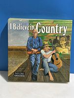 Front cover of the vinyl box set showing country-themed artwork with an older man and young boy with guitar.
