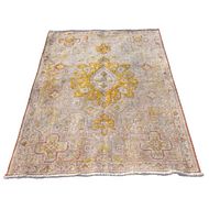 Full top-down view of the rug showing central medallion and border motifs