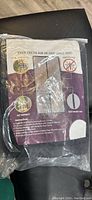 Magnetic screen door in sealed plastic package showing product label with features and instructions.