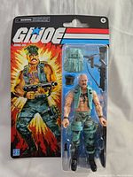 Image of GI Joe Gung-Ho action figure in original blister packaging showing figure and accessories.