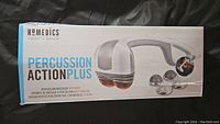 Original retail box showing the product image and model name Homedics Percussion ActionPlus massager.
