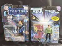 Pair of new vintage Star Trek action figures in original sealed packages, Dr. Beverly Crusher and Captain James T. Kirk